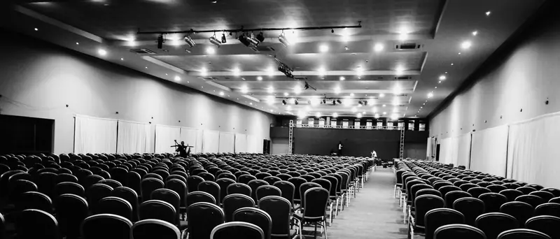 Empty conference hall set up for an event in Munyonyo, Kampala